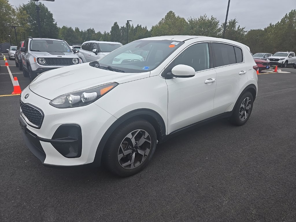 Used 2020 Clear White Kia LX image 1