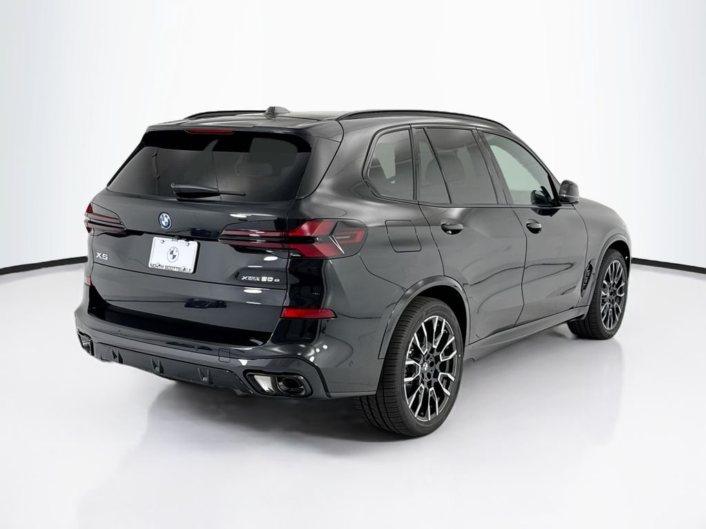 New 2026 Black Sapphire Metallic BMW xDrive50e image 5