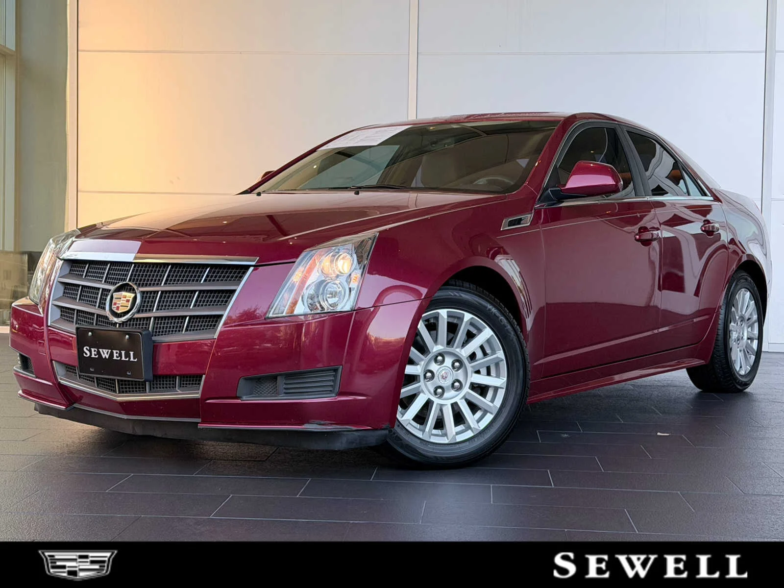 Used 2011 CRYSTAL RED TINTCOAT Cadillac Luxury image 1