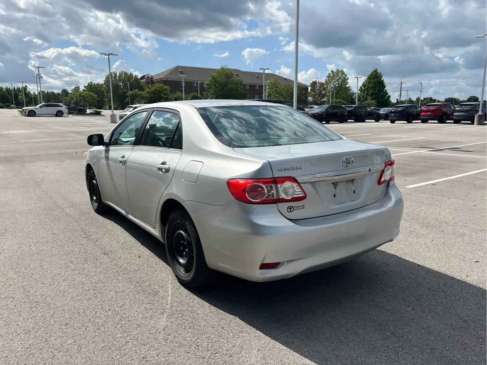 Used 2013 Classic Silver Metallic Toyota LE image 3