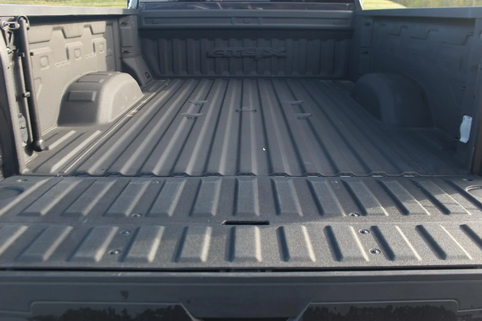 Used 2024 Titanium Rush Metallic GMC AT4X image 12