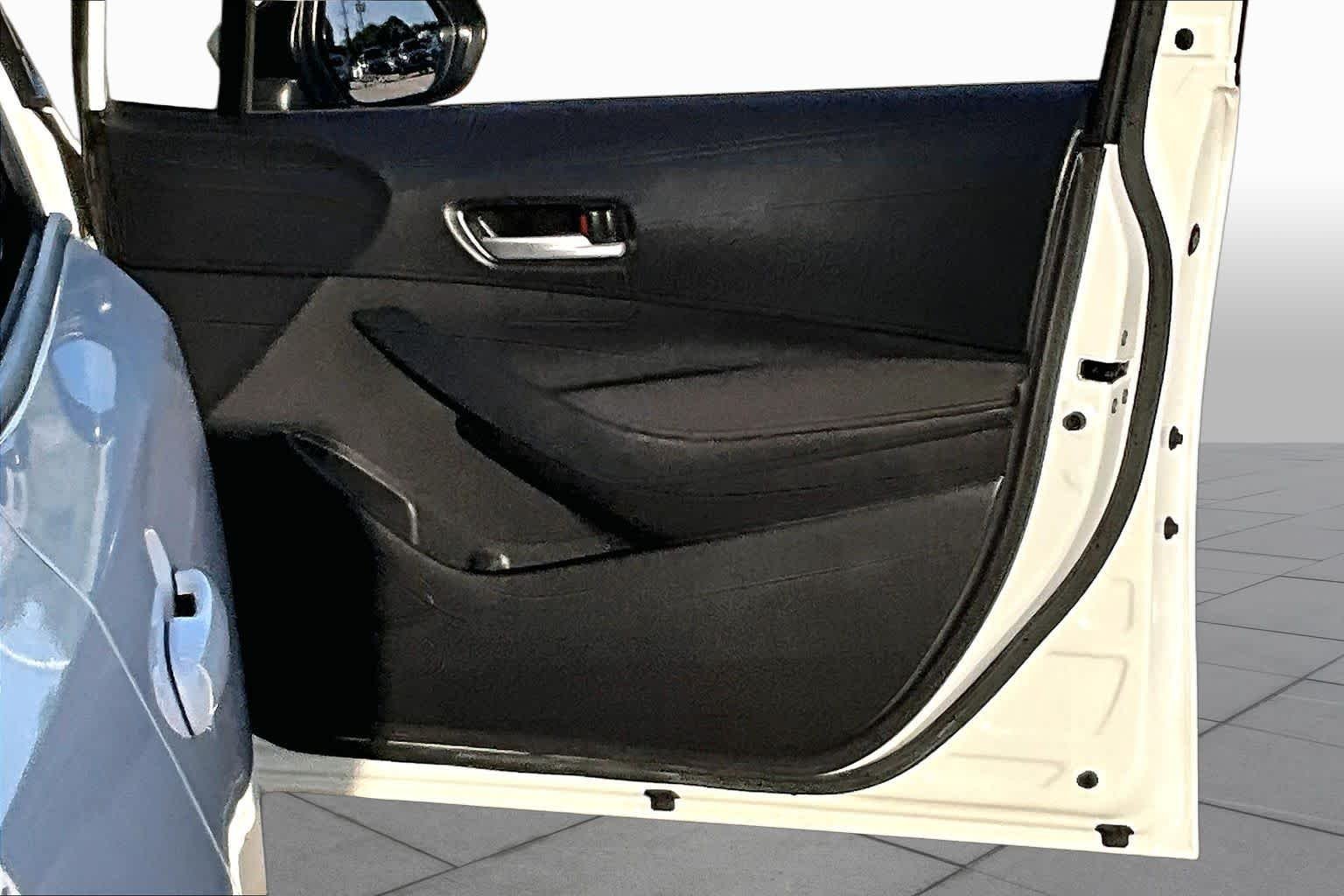 Used 2021 Super White Toyota LE image 23