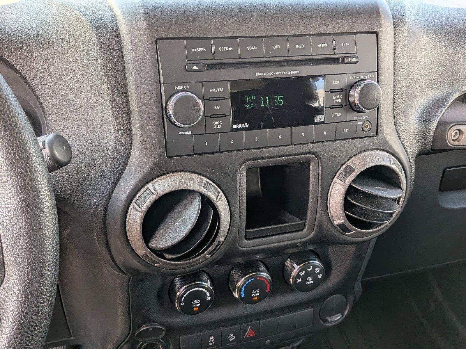 Used 2016 Black Clearcoat Jeep Sport image 12