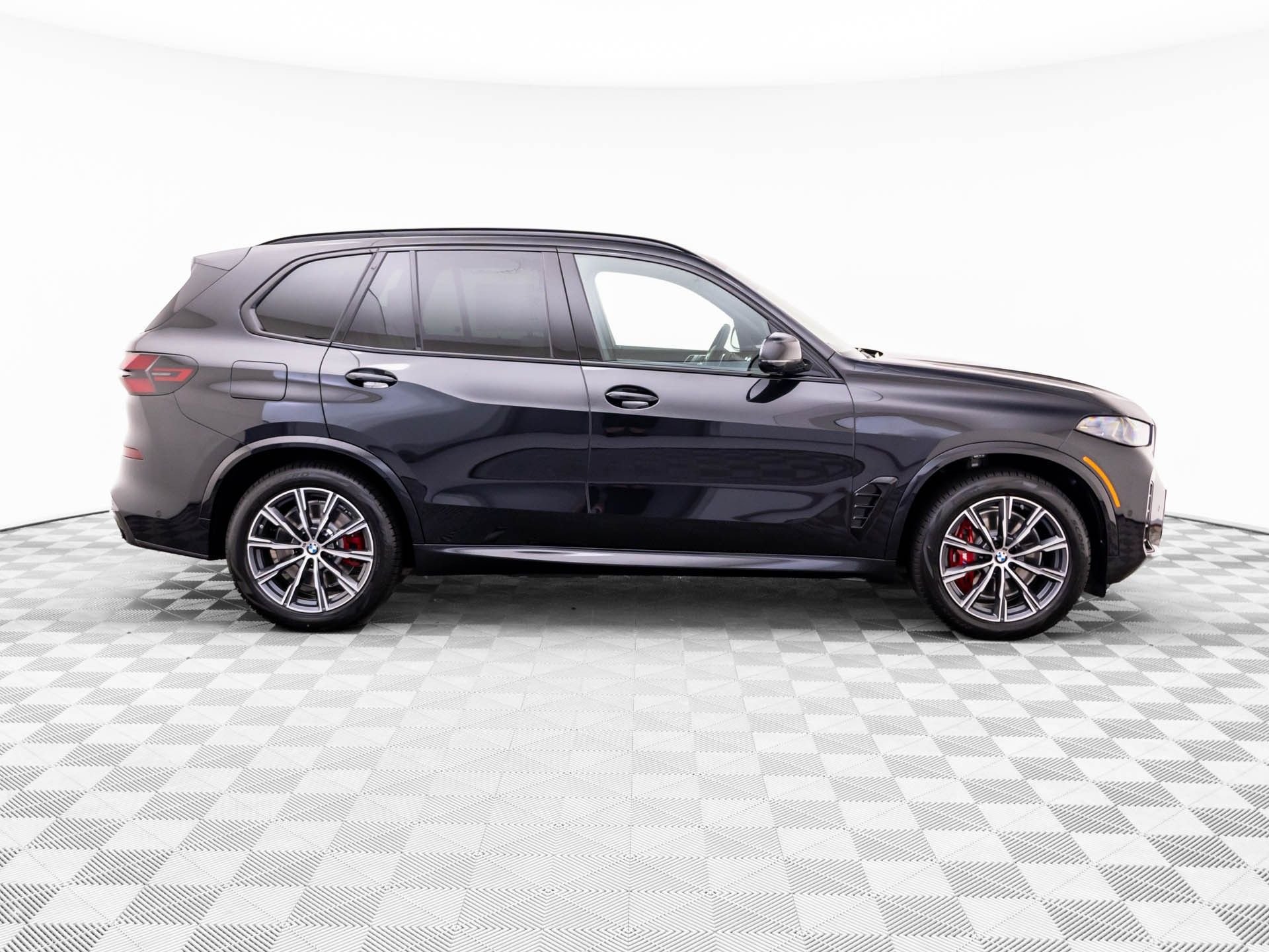 New 2026 Black Sapphire Metallic BMW xDrive50e image 8