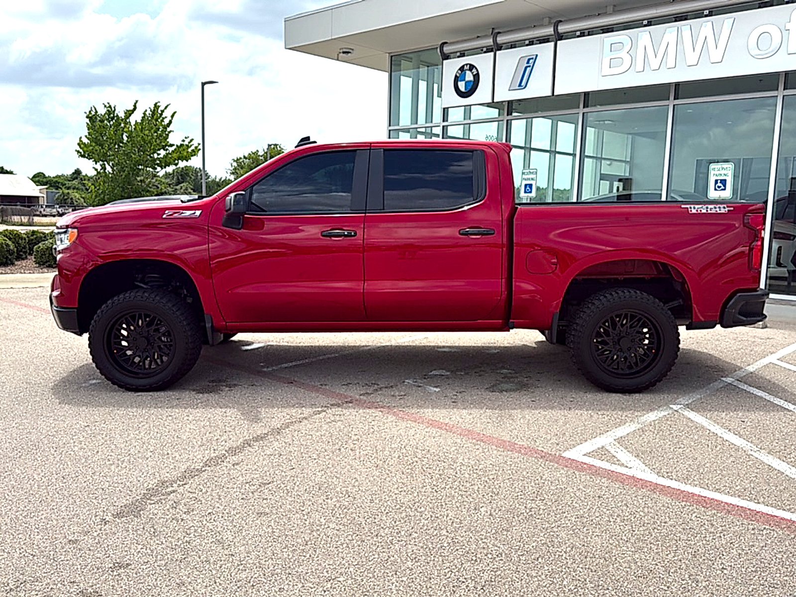 Used 2025 Radiant Red Tintcoat Chevrolet 4WD Crew Cab Short Bed LT Trail Boss image 4