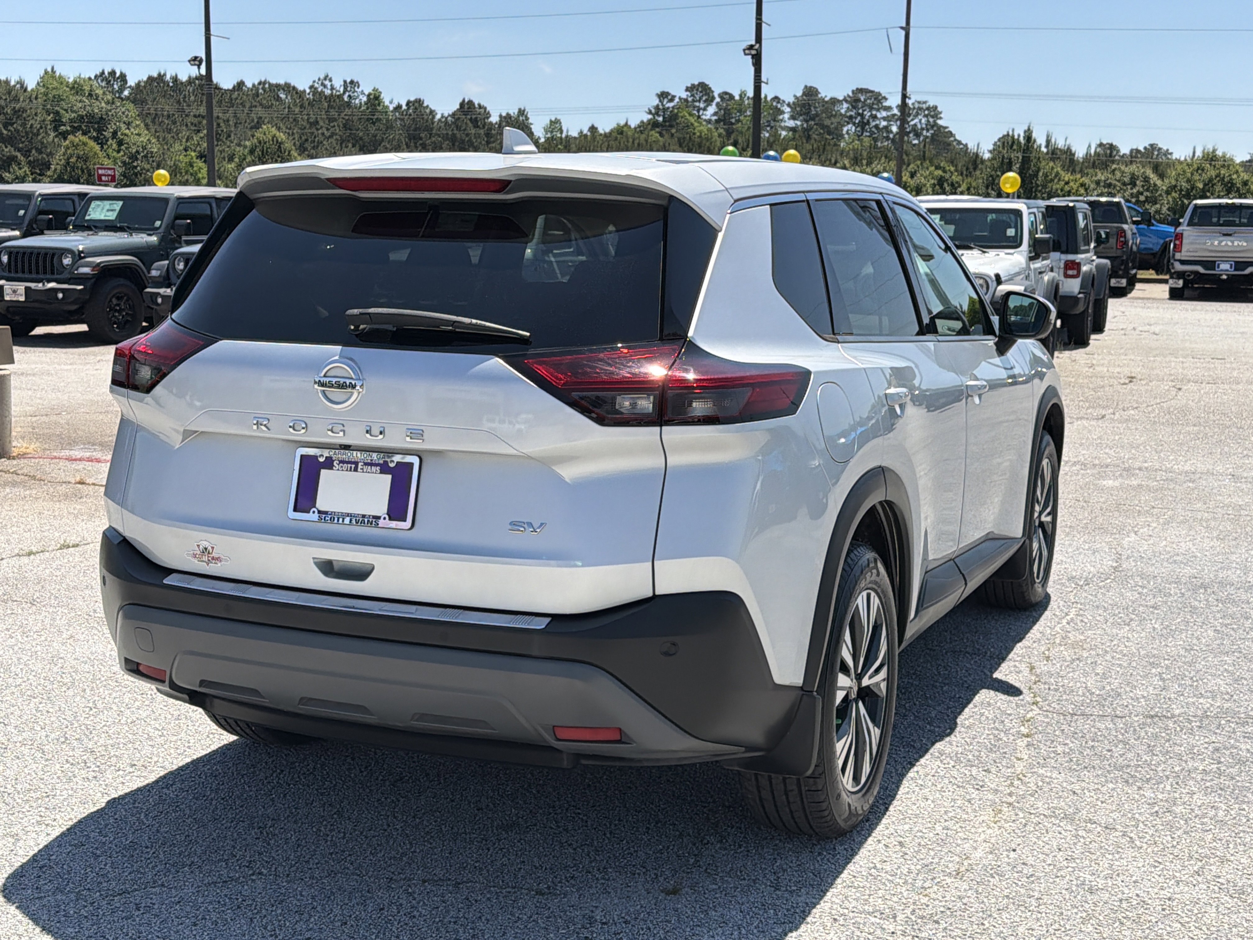 Used 2021 Brilliant Silver Metallic Nissan SV image 11