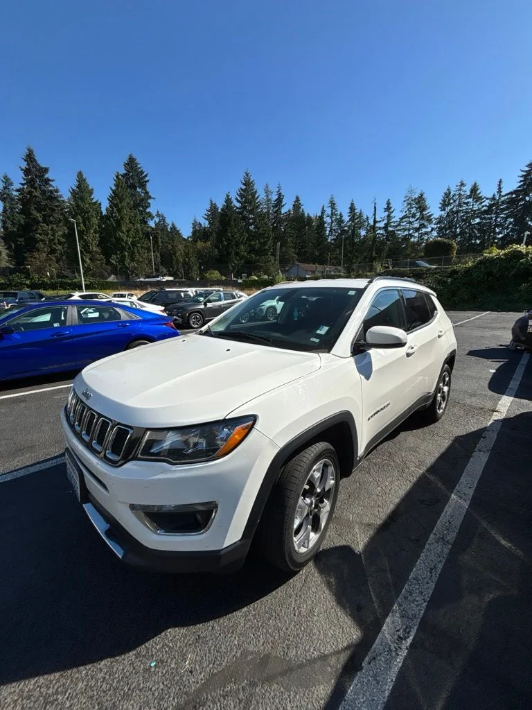 Used 2019 White Clearcoat Jeep Limited image 1