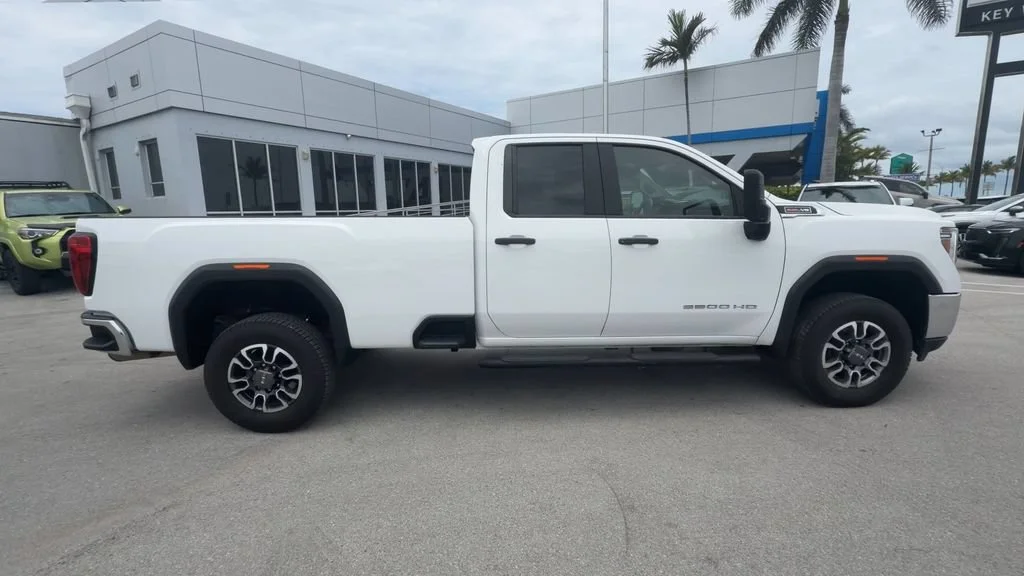Used 2021 SUMMIT WHITE GMC 2WD Double Cab Long Bed image 9