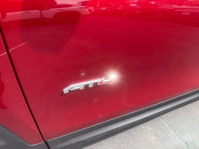 Used 2023 Volcanic Red Tintcoat GMC AT4 image 3