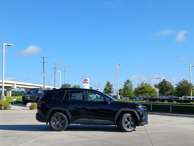New 2026 Midnight Black Metallic Toyota LE image 4
