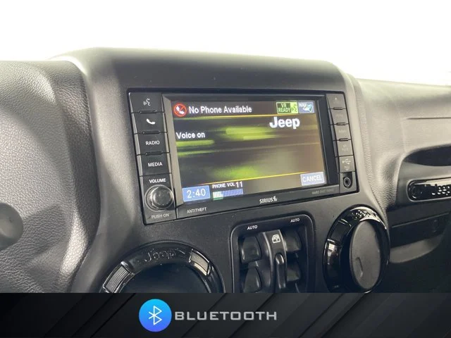 Used 2015 Black Jeep Unlimited Sahara image 3