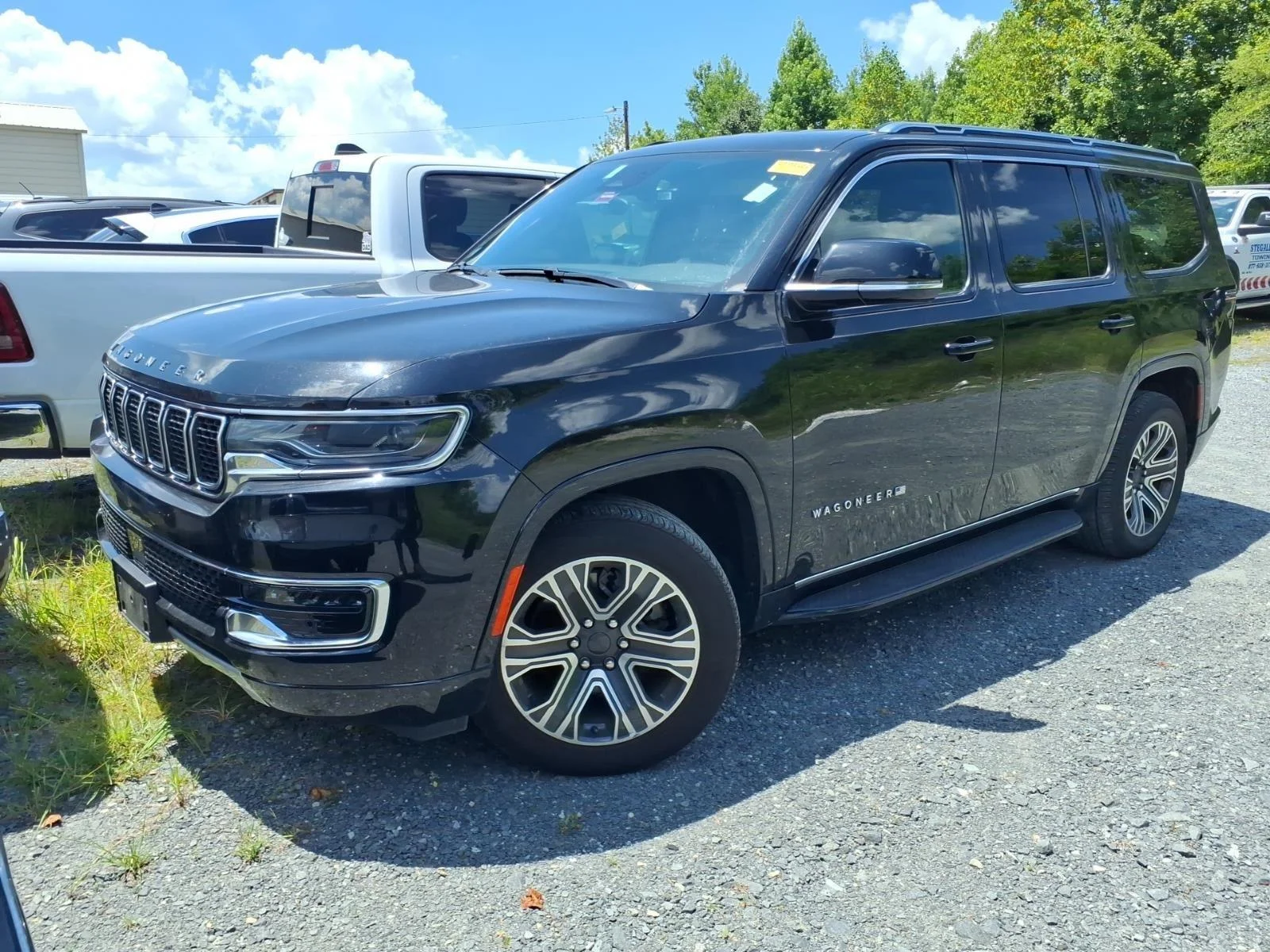 Used 2024 Diamond Black Crystal Pearlcoat Jeep Series II image 1