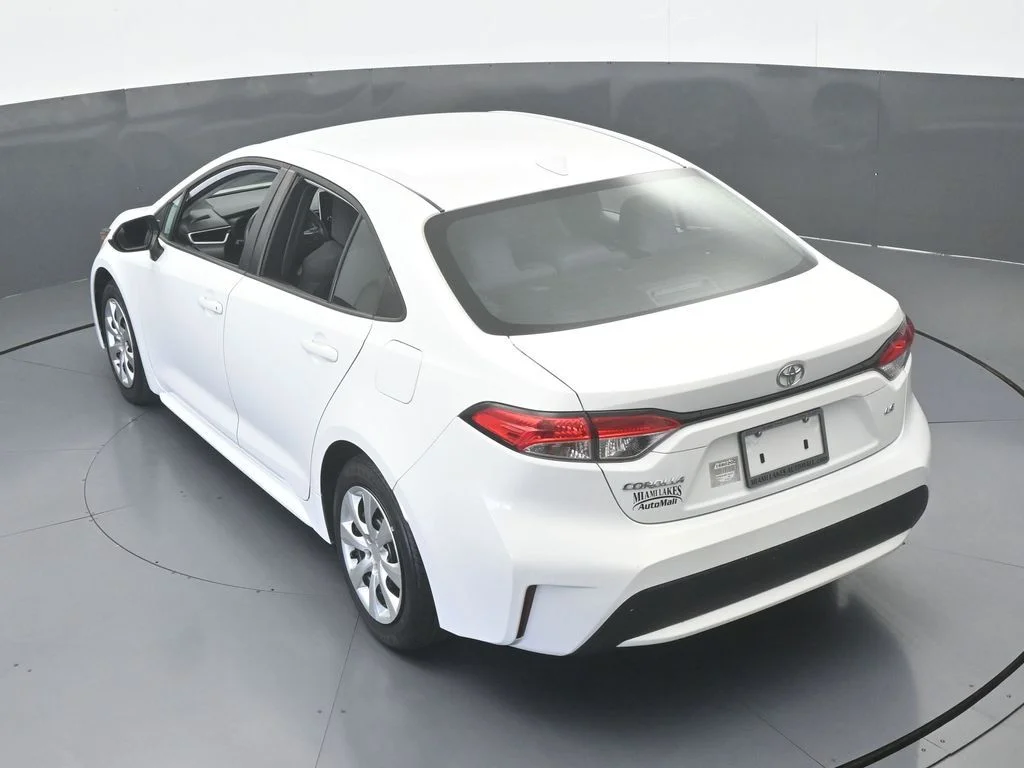 Used 2021 Super White Toyota LE image 38
