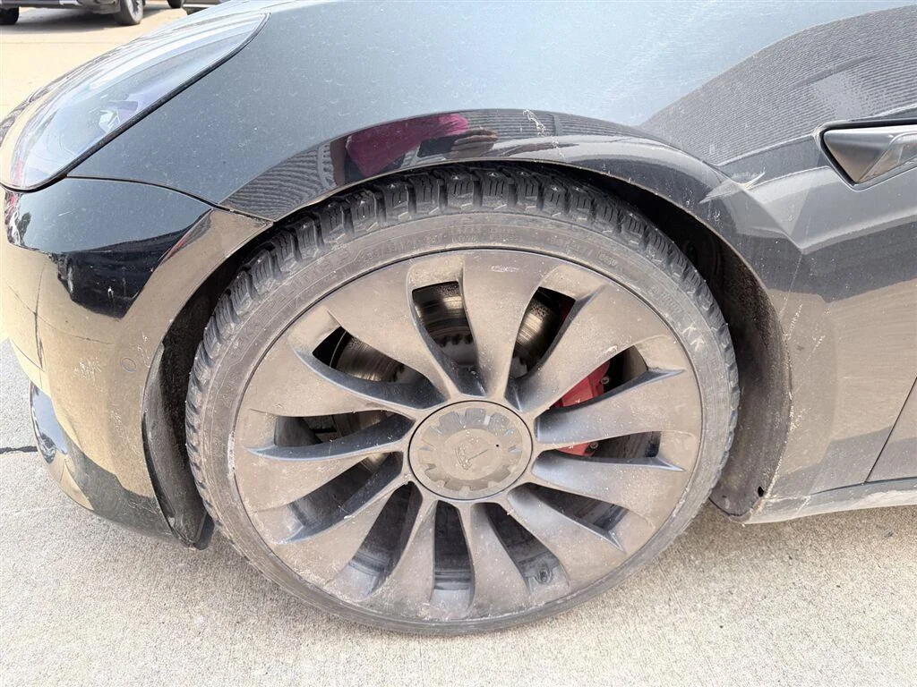 Used 2021 Solid Black Tesla Performance image 4