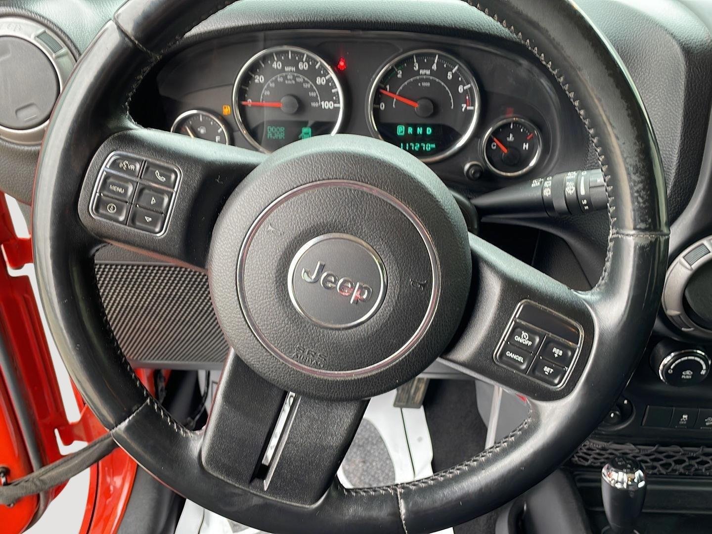 Used 2015 Sunset Orange Pearlcoat Jeep Sport image 11