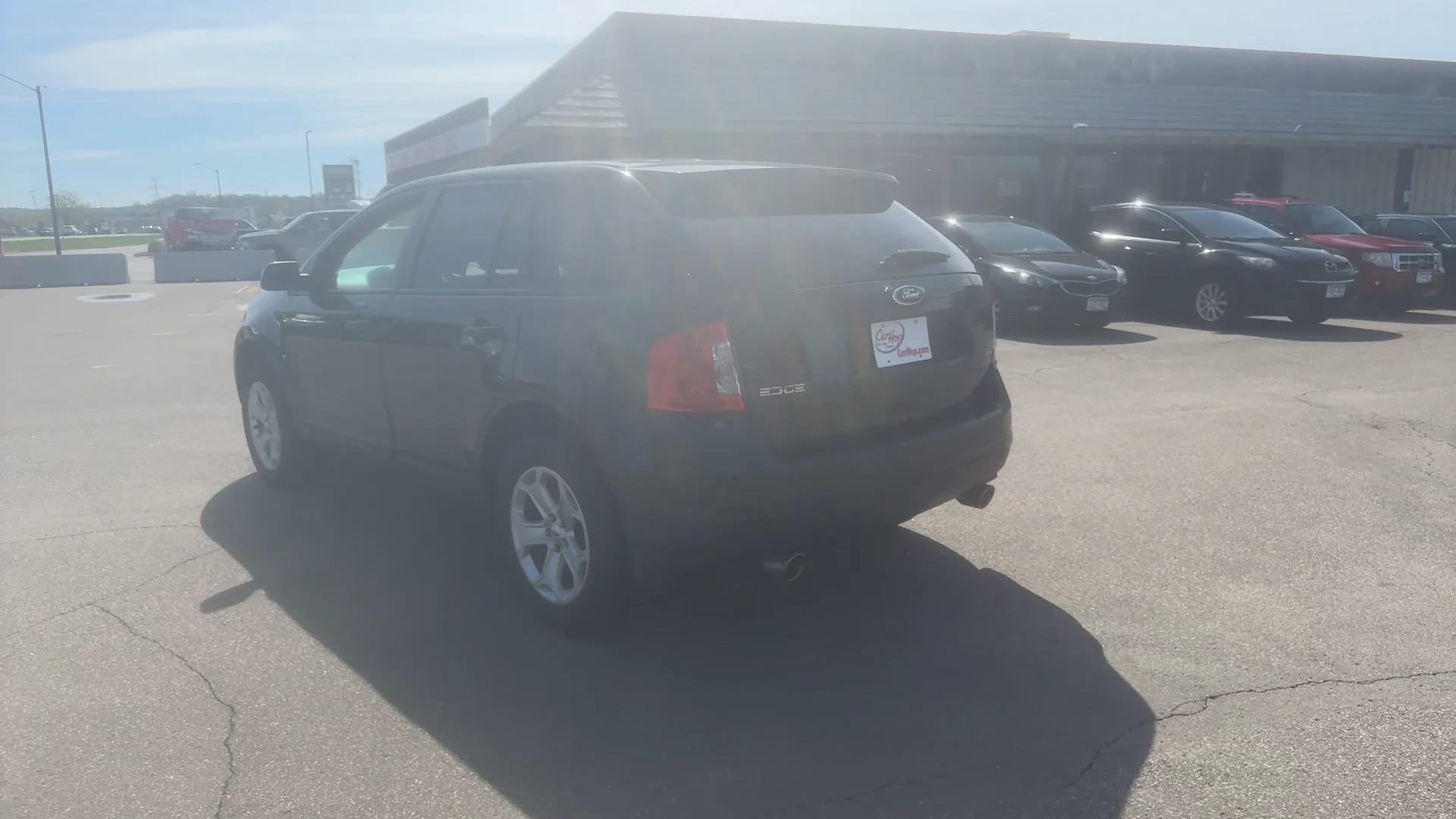 Used 2013 Black Ford SEL FWD image 7