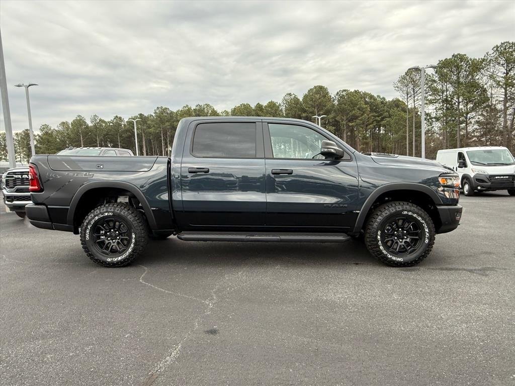 New 2026 Forged Blue Metallic Exterior Paint RAM Rebel Crew Cab 4x4 5