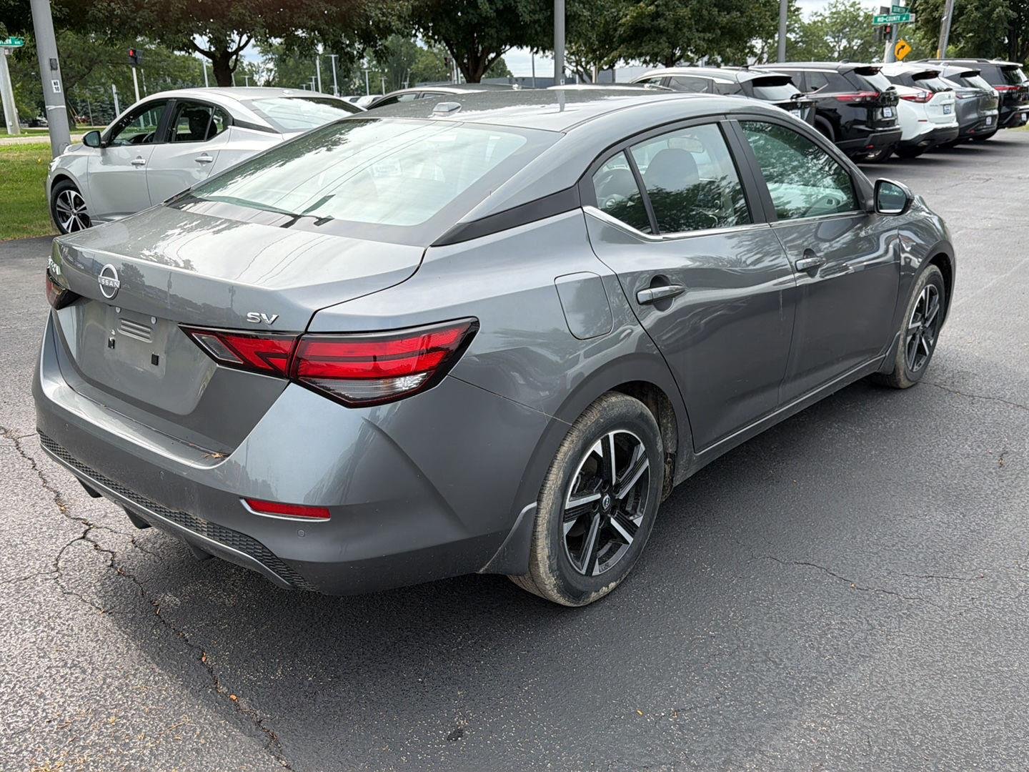 Used 2024 Gun Metallic Nissan SV image 4