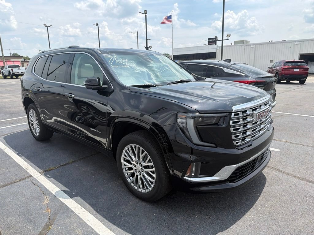 Used 2024 Ebony Twilight Metallic GMC Denali image 1