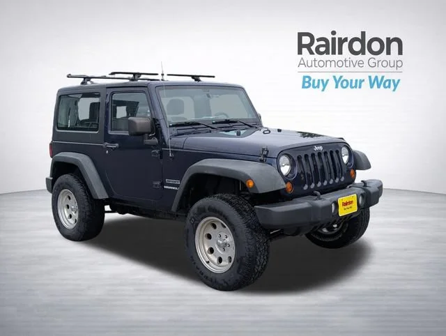 Used 2013 True Blue Pearlcoat Jeep Sport image 1