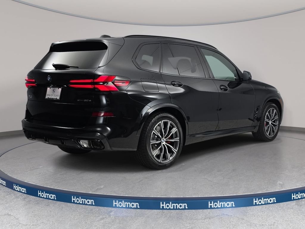 New 2026 Black Sapphire Metallic BMW xDrive50e image 5