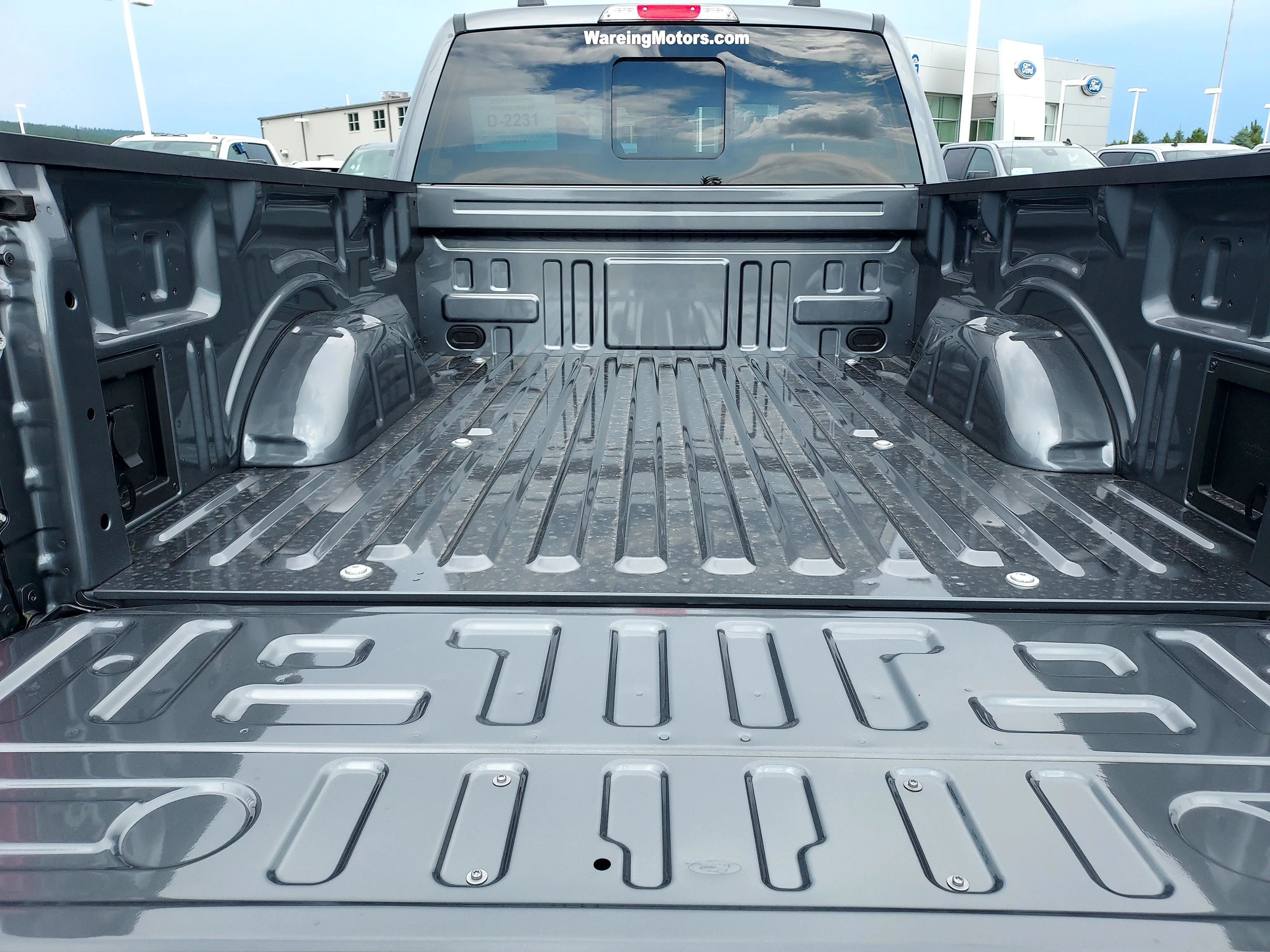 New 2026 Carbonized Gray Metallic Ford LARIAT image 8