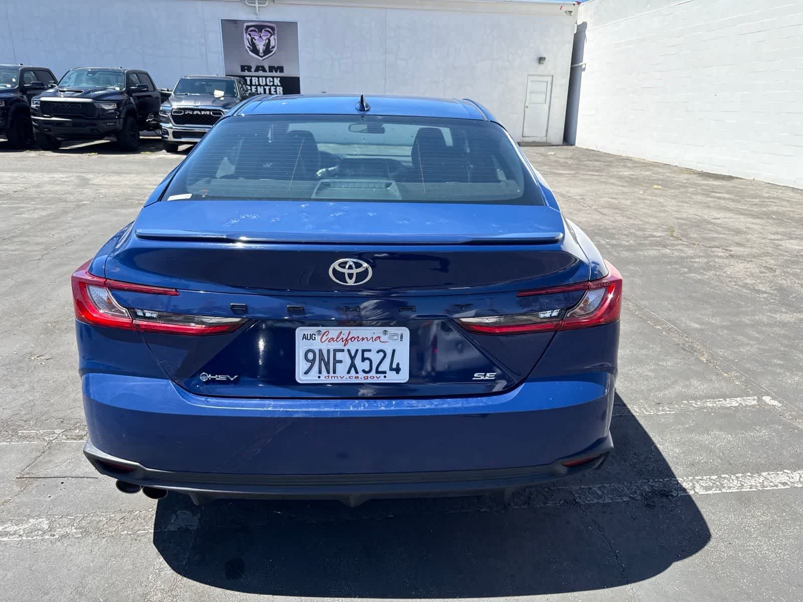 Used 2025 Reservoir Blue Toyota SE image 17