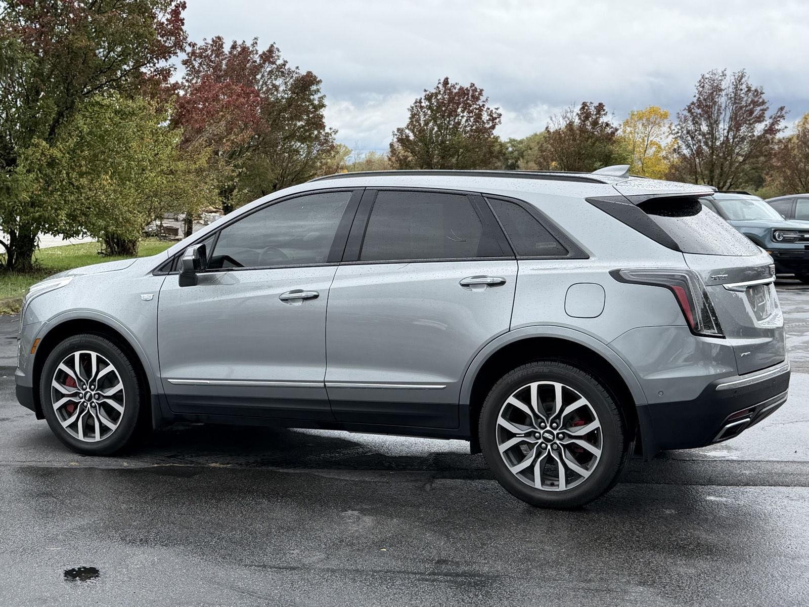 Used 2024 Argent Silver Metallic Cadillac AWD Sport image 5