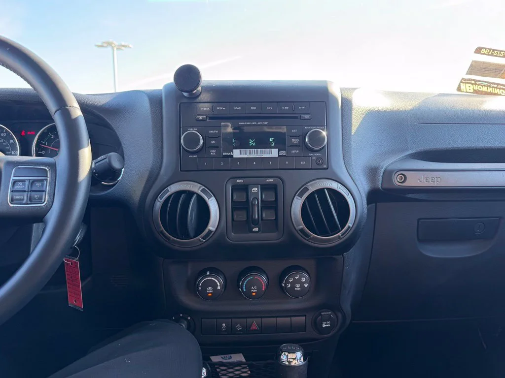 Used 2014 Black Jeep Unlimited Sport image 9
