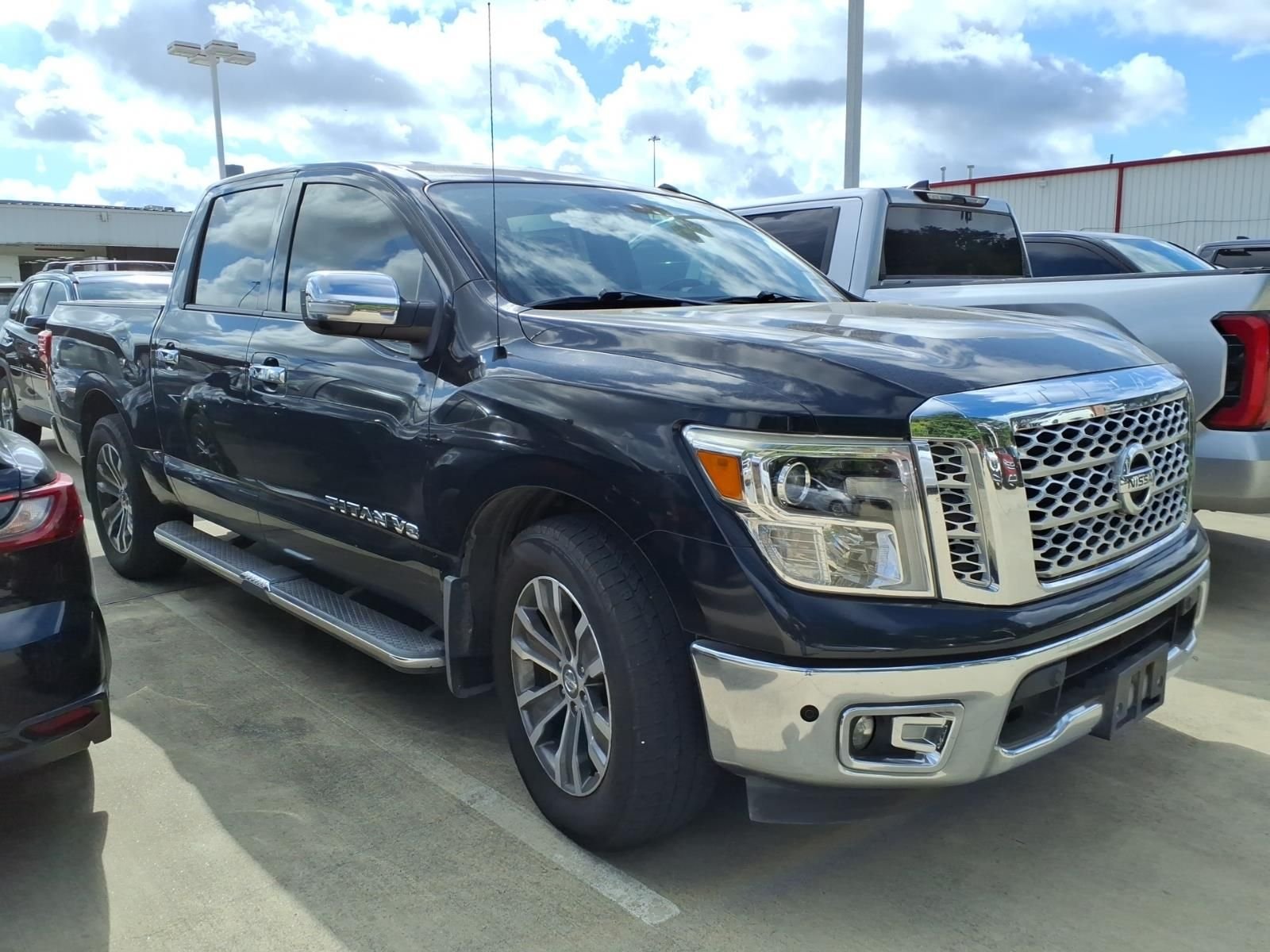 Used 2019 Magnetic Black Nissan SL image 1