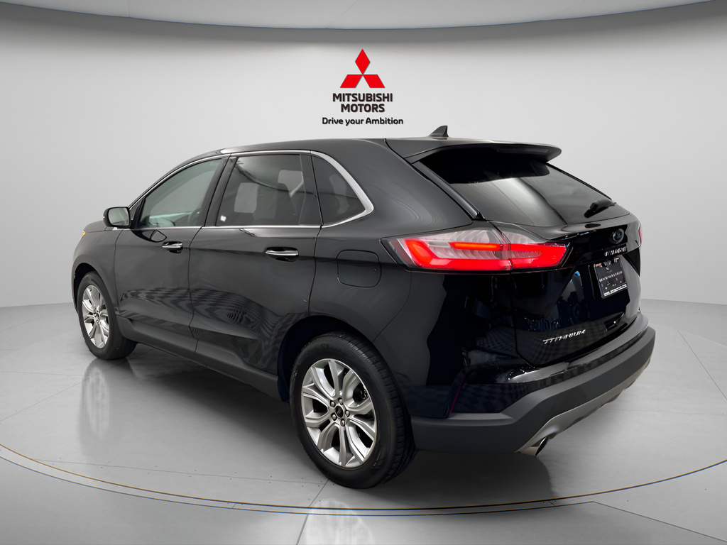 Used 2024 Black Metallic Ford Titanium AWD image 4