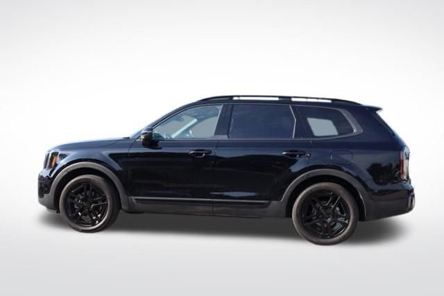 Used 2025 Ebony Black Kia EX X-Line image 7