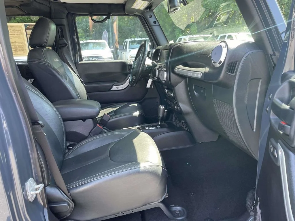Used 2016 Black Jeep Unlimited Sahara image 15