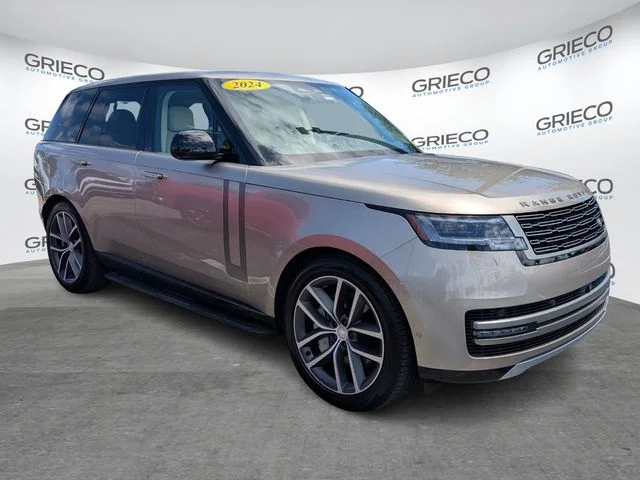 Used 2024 Gold Land Rover SE image 1