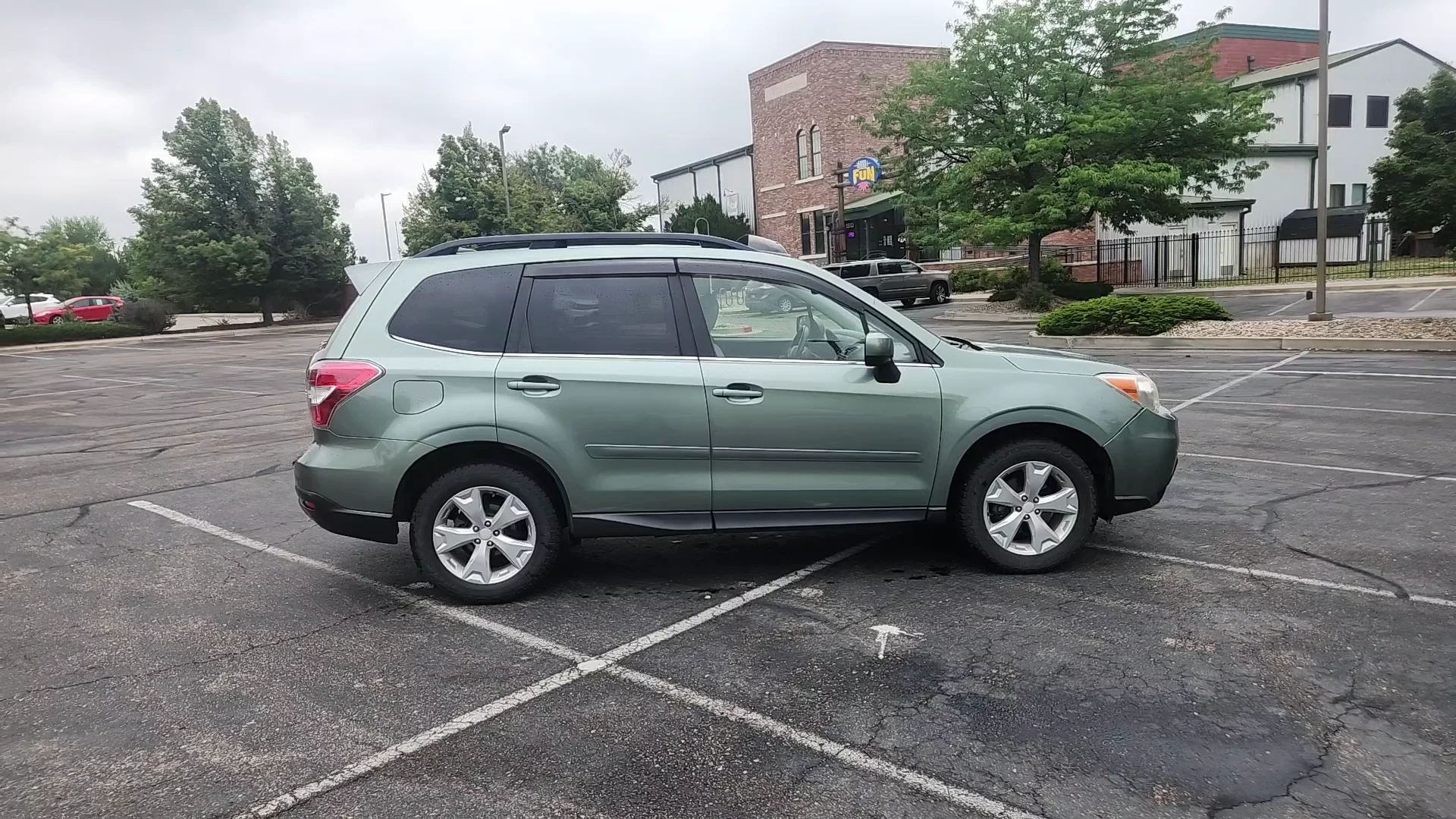 Used 2014 Green Subaru 2.5I LIMITED image 4
