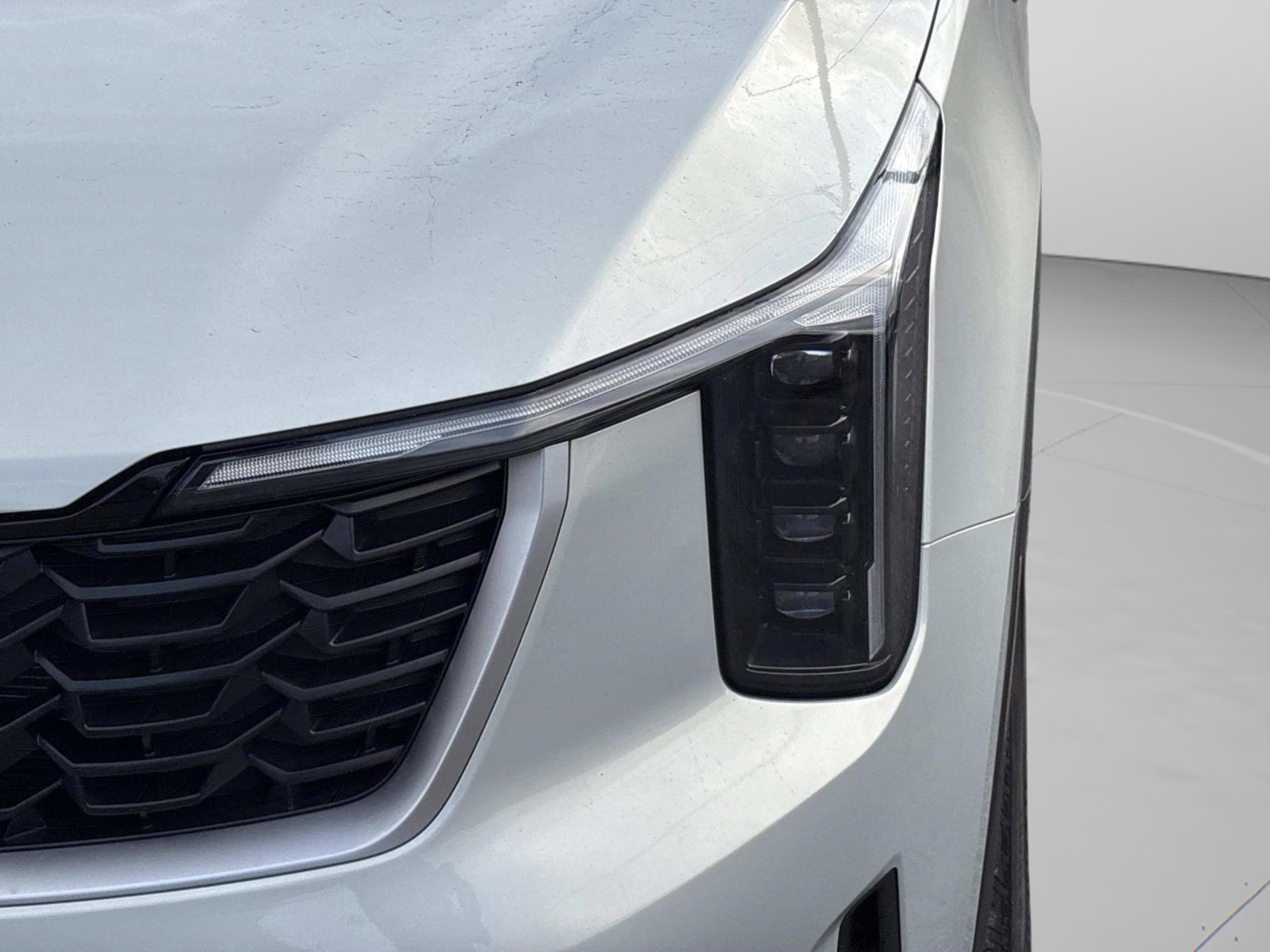 New 2026 Ivory Silver Kia LX image 10