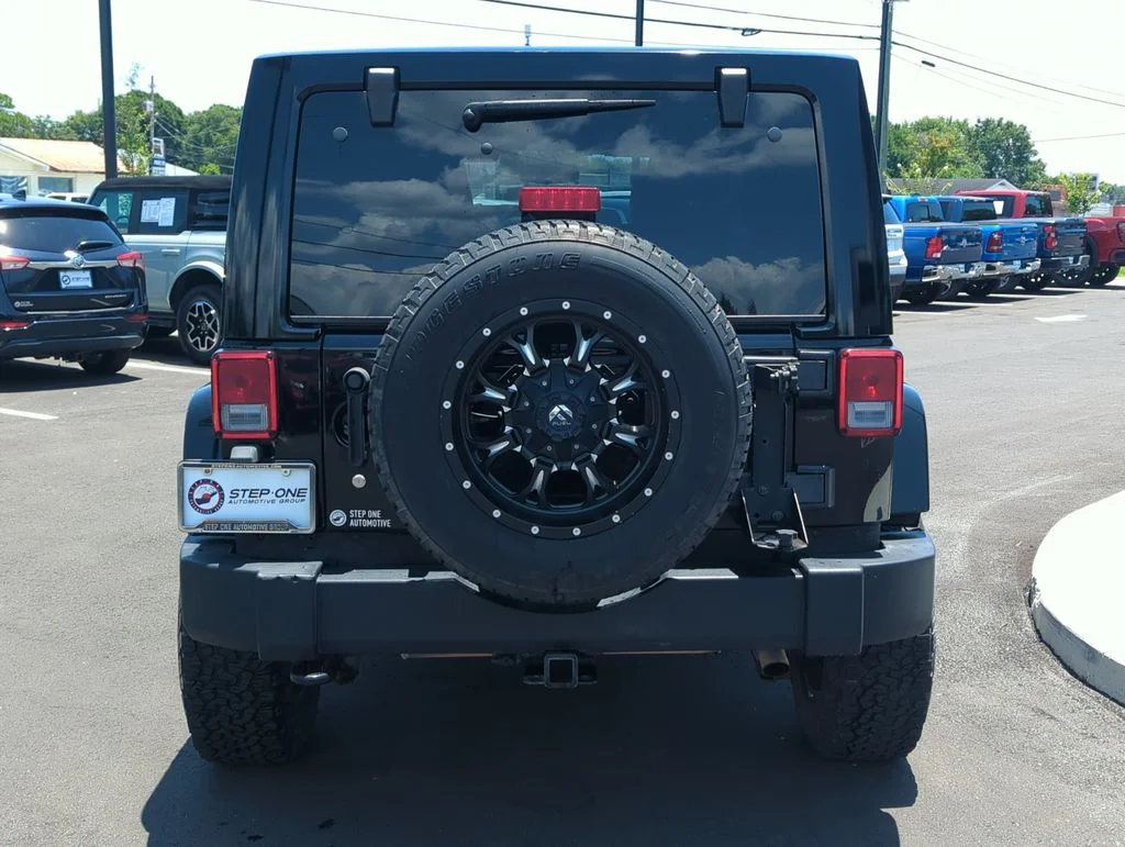 Used 2014 Black Jeep Unlimited Sahara image 6