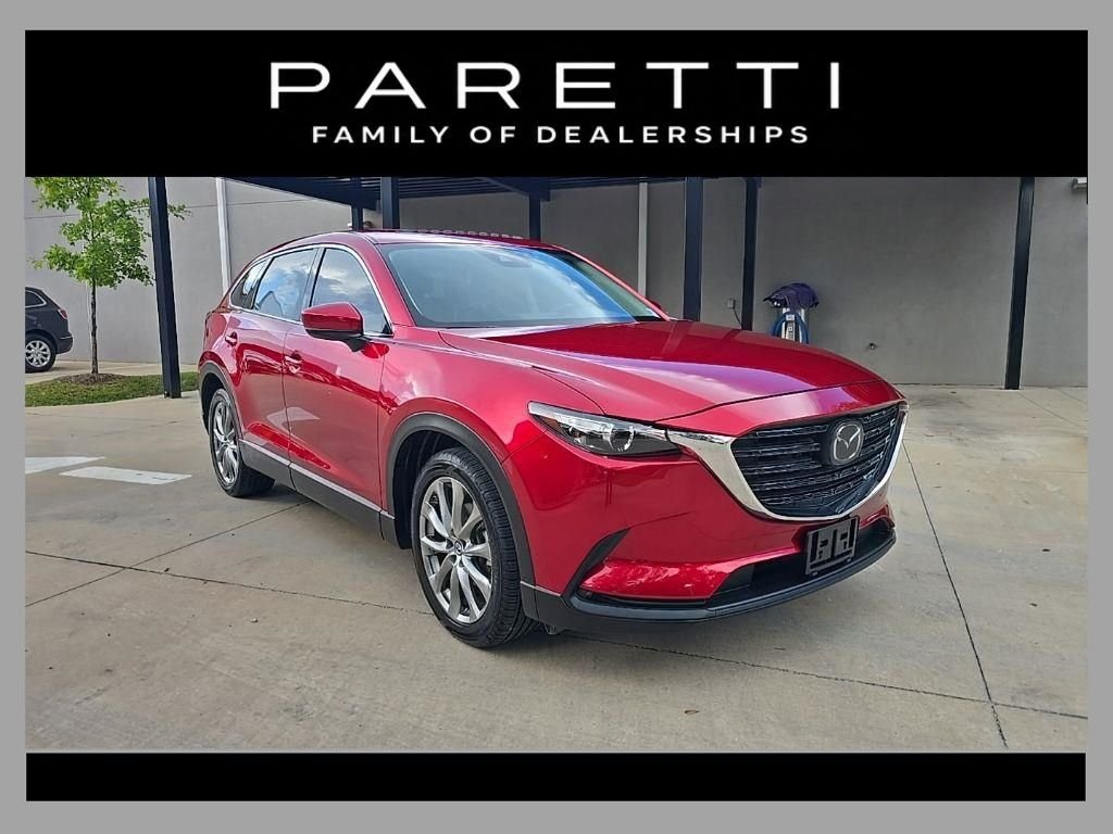 Used 2023 Red Mazda Touring Plus image 1