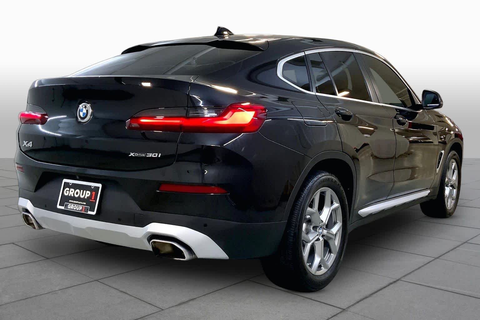 Used 2024 Black Sapphire Metallic BMW xDrive30i image 12