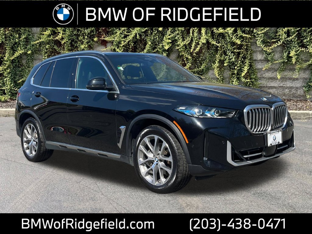 Used 2024 Black Sapphire Metallic BMW xDrive40i image 1