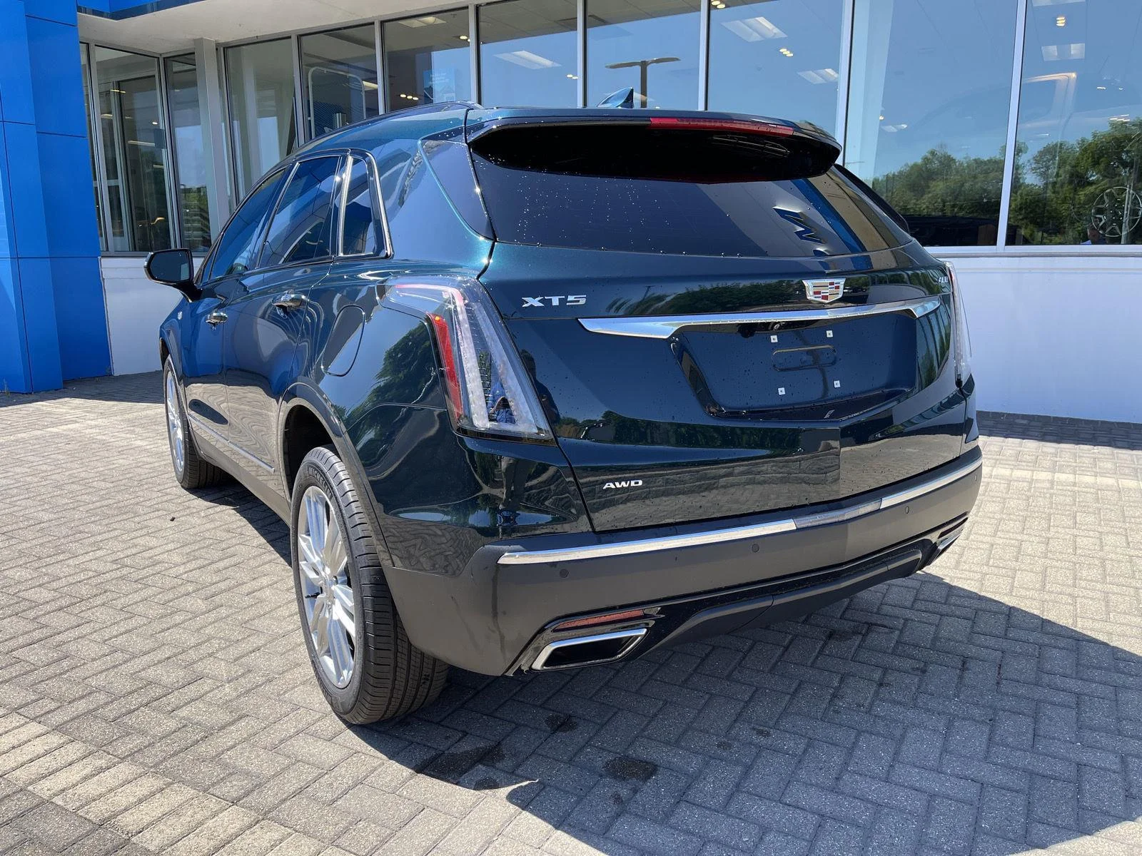 Used 2024 Emerald Lake Metallic Cadillac Sport image 3