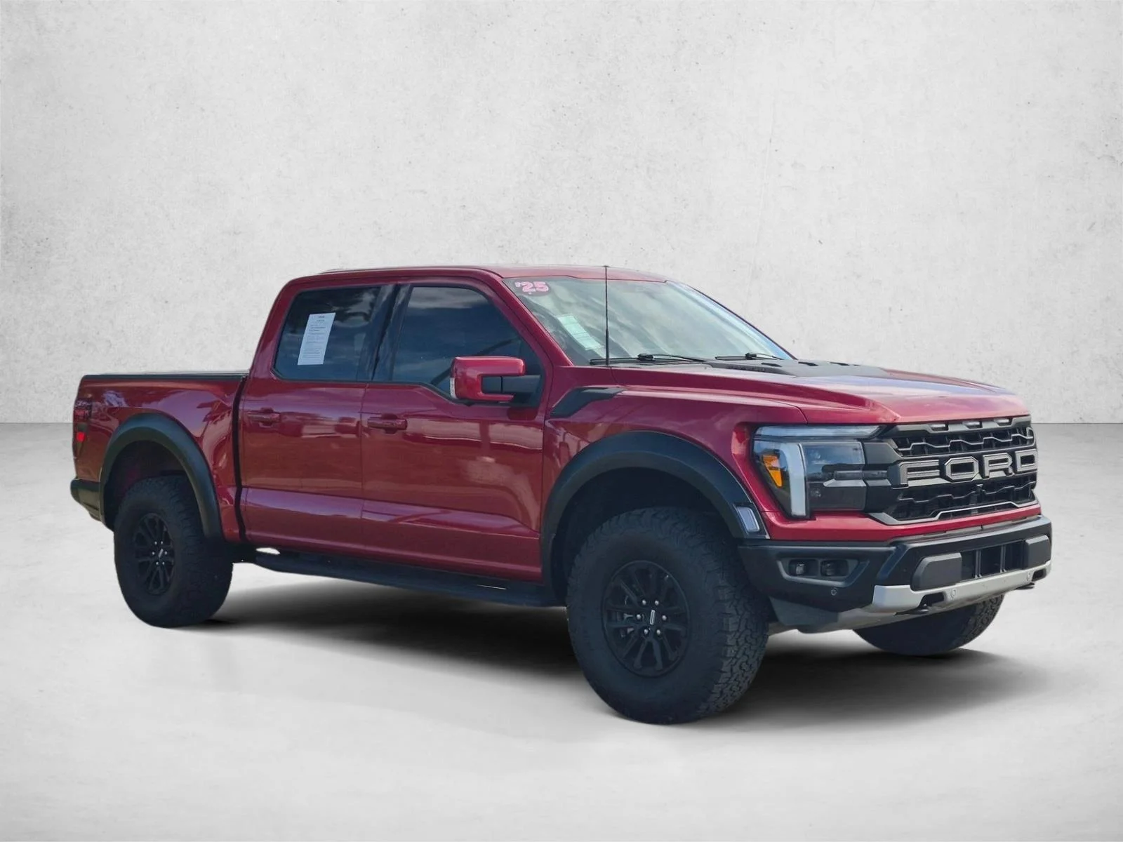 Certified Used 2025 Rapid Red Metallic Tinted Clearcoat Ford Raptor image 3