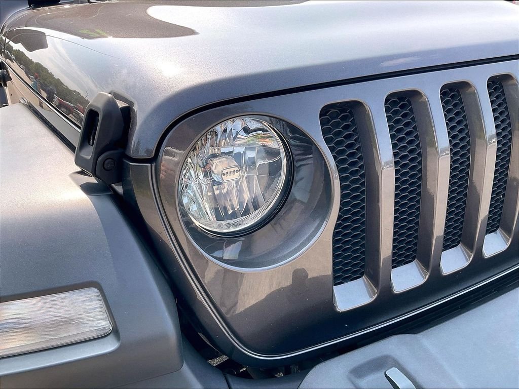 Used 2021 Granite Crystal Metallic Clearcoat Jeep Unlimited Sport S image 28