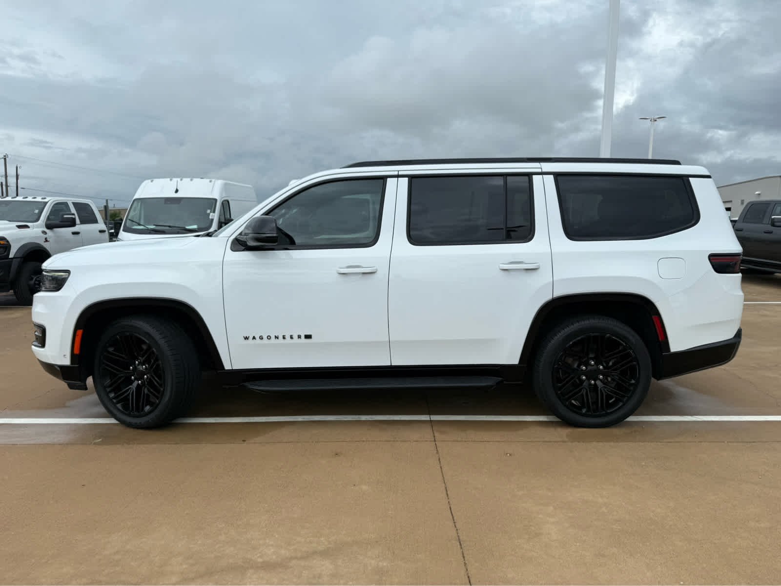 Used 2023 Bright White Clearcoat Jeep Series II Carbide image 12