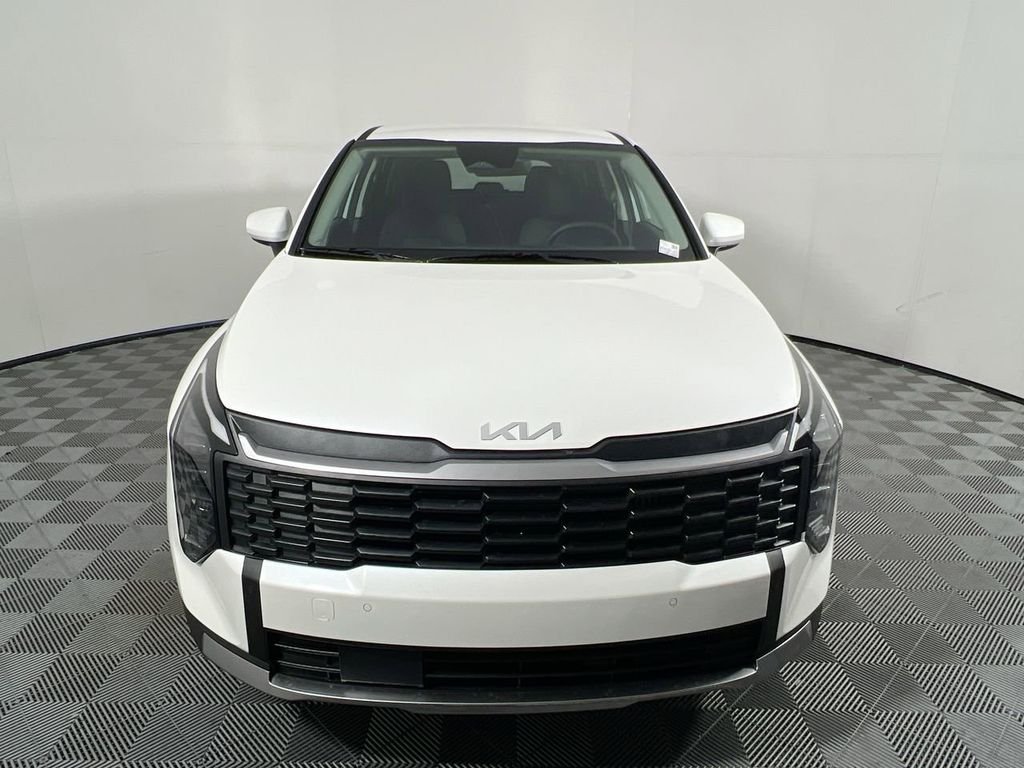 New 2026 Snow White Pearl Kia LX image 10