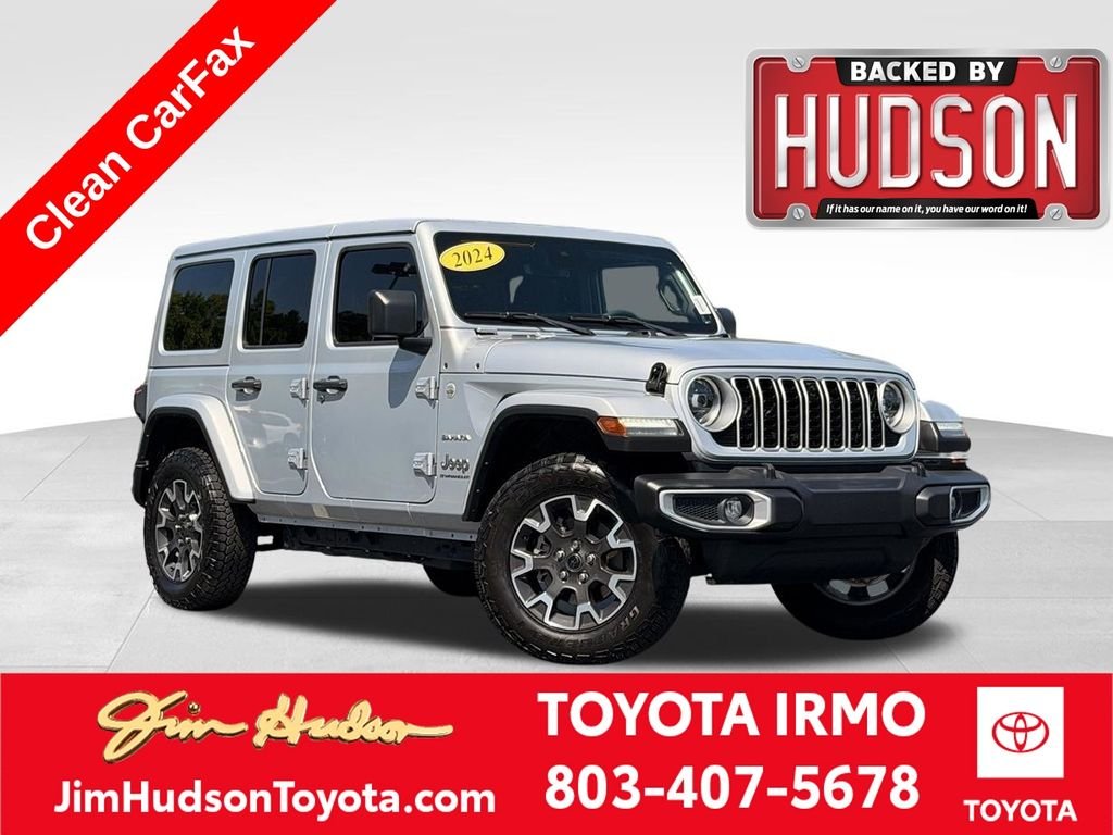 Used 2024 Silver Jeep Sahara image 1