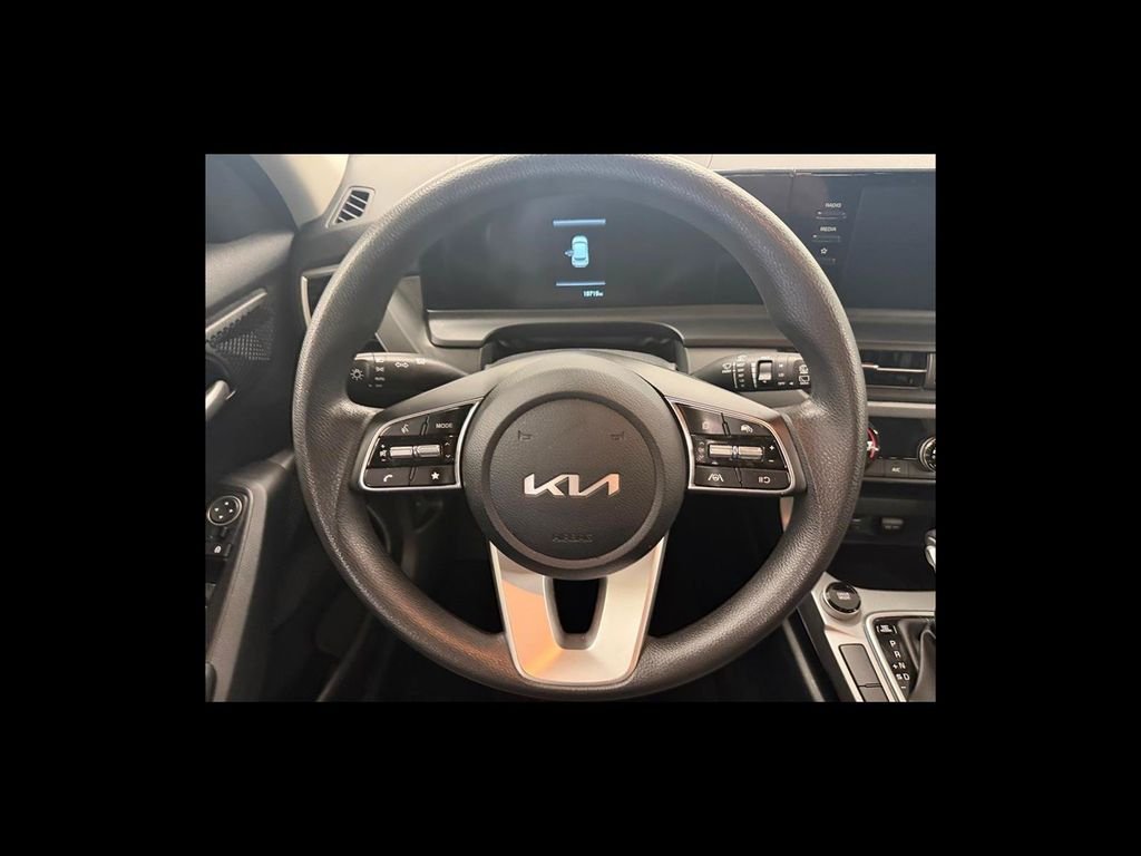 Used 2025 Blue Kia LX image 14