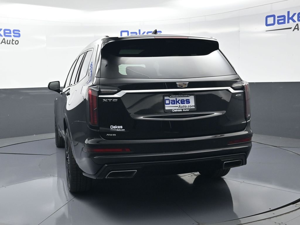 Used 2023 Stellar Black Metallic Cadillac Sport image 6