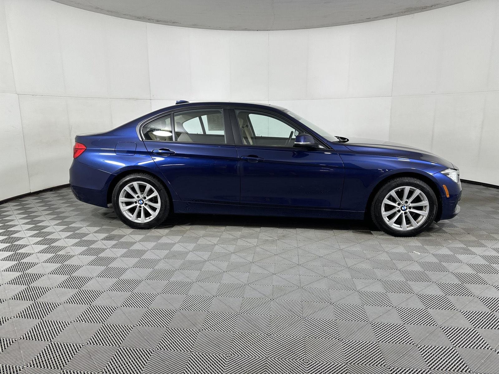 Used 2018 Mediterranean Blue Metallic BMW 320i xDrive image 12
