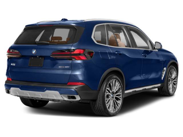 Used 2025 Tanzanite Blue II Metallic BMW xDrive40i image 2